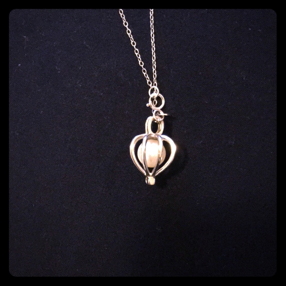 Sterling silver charm with real pearl